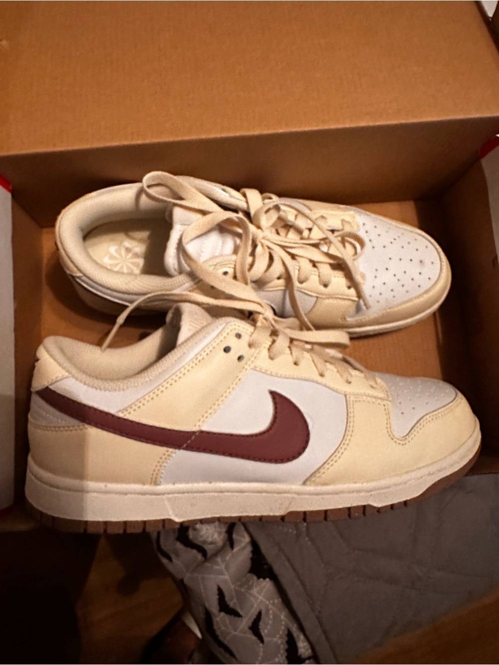 Nike Low-Top Sneakers in Cream with Maroon Swoosh